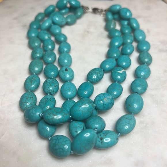 Jewelry - Three. Strand turquoise necklace.